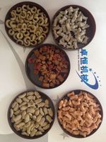Ligne de production d'extrusion de nourriture pour animaux à double vis pour croquettes pour chiens avec tension personnalisée pour la transformation d'aliments pour animaux