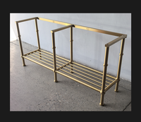 Lavabo console en marbre vert avec design cannelé, pieds en laiton, finition bronze, étagère inférieure, porte-serviettes de vanité en marbre