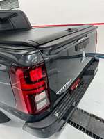 Couverture de benne manuelle enroulable pour Mitsubishi Triton L200, étanche, protection UV, sans perçage, fourniture d'usine