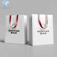 Chinesische Hersteller Günstige Handtasche Schwarz-Weiße Papiertüte mit Logodruck