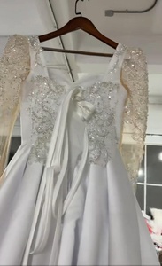 Robe de mariée de luxe 2026 à col illusion et manches longues, en satin et dentelle avec appliques perlées, style robe de bal – Grande vente en Afrique - Product Image 5