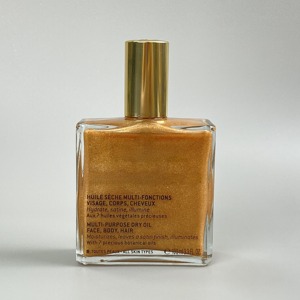 Huile corporelle scintillante à base d'eau, marque privée MLM, avec bouchon doré cylindrique, nourrissante et illuminatrice, pour un effet illuminateur corporel. - Product Image 3