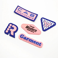 Prises créatives en PVC Étiquette en silicone 3d Logo en caoutchouc gaufré Marque personnalisée Respectueux de l'environnement