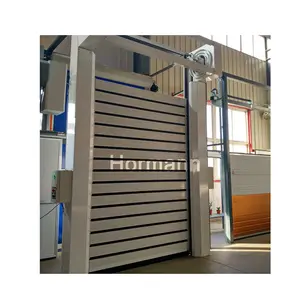 La griglia automatica in metallo all'ingrosso della fabbrica arrotola la porta del pannello rigido ad alta velocità dell'isolamento veloce