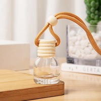 Vente chaude verre voiture parfum bouteille pendentif 6ml rond voiture diffuseur bouteille parfum avec fils et bouchons vide suspendu