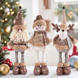 Poupée de Noël rétractable vintage en peluche (Père Noël ou Bonhomme de neige) sur pied, style rétro, pour décoration de bars et centres commerciaux - Product Image 1