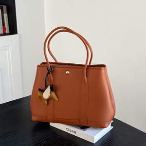 Bolso de Jardín 2026, Nuevo Bolso Tote de Gran Capacidad para Mujer, Bolso de Hombro con Cierre de Botón, Costuras de PU, Little Pegasus - Product Image 1