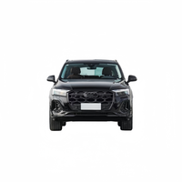 Pour Audi Q7 (2024-2025) : Bande décorative noire pour cadre de phare antibrouillard SQ7 amélioré, avec lèvre arrière et quatre sorties d'échappement.