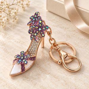 Llavero de lujo con diseño de zapato de tacón alto 3D, flor de diamantes de imitación y mosquetón de aleación de zinc, accesorio de moda. - Product Image 2