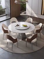 Table à manger ronde combinée 2026 de luxe pour la maison, ultra-minimaliste et moderne, avec chaises et plateau tournant en pierre frittée