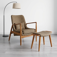 Fauteuil de loisirs en bois massif et cuir, avec assise rembourrée et repose-pieds, idéal pour hôtels et salons (vente en gros)