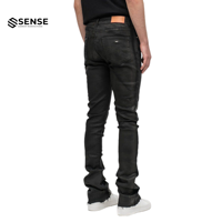 Fabricant de jeans sur mesure, streetwear, hip hop, jeans évasés déchirés et cirés argentés, pour hommes