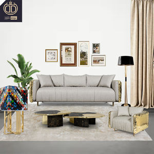 Canapé de luxe moderne et lourd en tissu gris avec structure en acier inoxydable doré pour grande villa, solution tout-en-un pour l'ameublement et <span class=keywords><strong>la</strong></span> décoration. - Product Image 1
