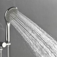 Ensemble de douche encastré 2-en-1 chromé avec pommeau de pluie rond, bras courbé, robinet dissimulé et douchette multifonction