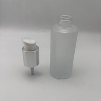 Haute qualité 60ml huile essentielle bouteille en verre forme ronde et 18/410 argent cosmétique Lotion traitement crème pompe