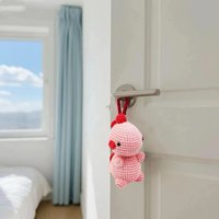 Jouet en peluche dinosaure rose fait main au crochet avec accents rouges, jouet unique pour enfants, adorable décoration de maison, cadeau
