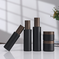 Flacon pulvérisateur en verre noir mat avec bouchon pour crème visage, capacités 30ml/50ml/60ml, impression sérigraphique