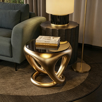 Table d'appoint en métal moulé au design unique, idéale pour les bureaux à domicile et les salons d'hôtel, un choix privilégié pour les tables basses.