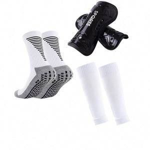 Chaussettes de football antidérapantes épaissies en tissu éponge avec couvre-jambes et protège-mollets divins - Product Image 1