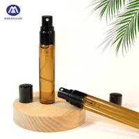 Haute qualité 10ml ambre verre Transparent sous pression Portable décanter bouteille vide 5ml parfum avec joint de pulvérisateur de pompe
