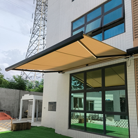 Auvent extérieur moderne motorisé électrique en tissu et aluminium de qualité commerciale pour porte d'entrée