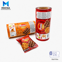 Film plastique laminé métallisé OPP VMCPP de qualité alimentaire, imprimé sur mesure, en rouleau, pour l'emballage de snacks, chocolats et bonbons