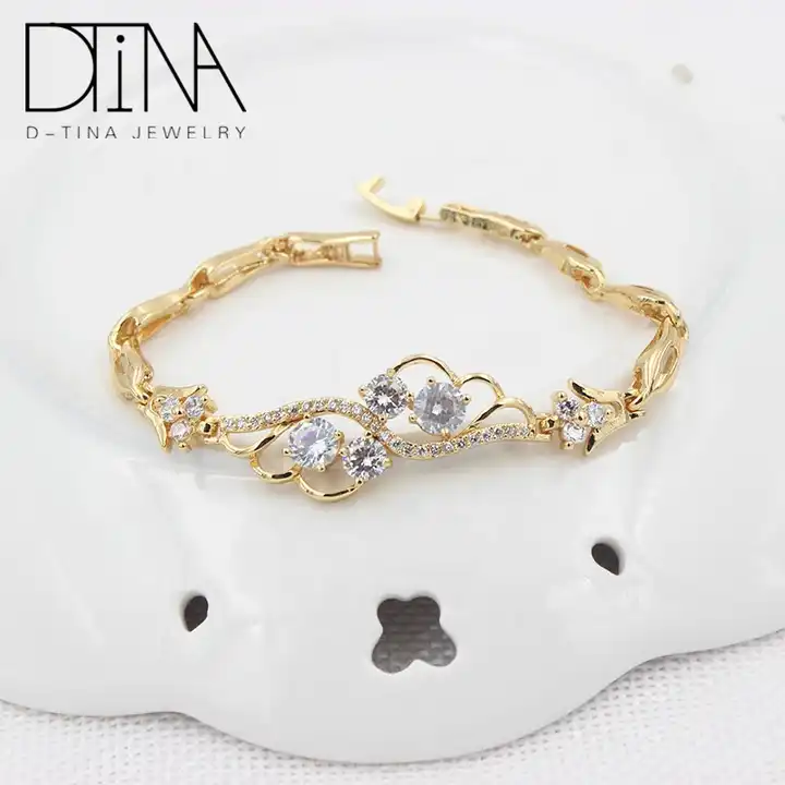 Shining Diva Fashion Latest Stylish Gold Plated Charm Bracelet for Women  and Girls (14667b)