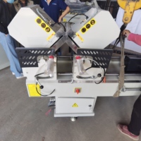 Venta directa de fábrica Máquina de corte oblicua doble de aluminio CNC de alta calidad Nueva condición Motor Core PLC Puertas Ventanas PVC UPVC
