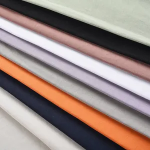 Tecido para camisetas de cor sólida, lote de estoque de tecido antiestático para camisetas, 65% algodão, 35% poliéster, fabricação OEM