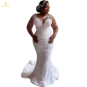 S3344A 2026 Vestido de Novia Moderno, Elegante y Real, de Manga Larga, Corte Sirena, Cola Desmontable de 2 en 1, con Encaje con Diseño Floral - Product Image 1