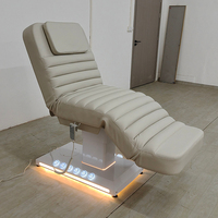Mesa de masaje de cuero con Base blanca moderna Cama de spa 3 motores Spa eléctrico Cosmético Cama facial con luces LED