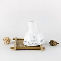 Diffuseur de parfum à bâtonnets en verre décoratif de différentes formes avec couvercle pour le confort domestique