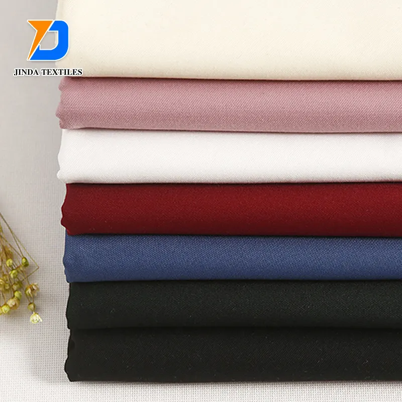 Tela de sarga suave de poliéster 100% de algodón polivinílico personalizada Jinda para ropa de trabajo uniforme tela de algodón 100 puro