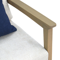 Fauteuil lounge en bois pour hall d'hôtel, avec dossier et assise rembourrés, structure en chêne américain massif importé