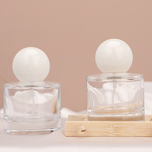 Transparent Glass Cosmetic <b>Spray</b> <b>Bottle</b> 30ml Cylinder Shape <b>Perfume</b> Clear Atomizer <b>Bottle</b> with White Round Ball Lids - Product Image 2