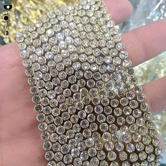 Commercio all'ingrosso di una riga di cristallo catena della tazza del rhinestone taglio oro impostazione