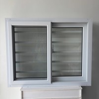 Fenêtre UPVC en verre gris anti-UV avec grille de sécurité en alliage d'aluminium et moustiquaire, entièrement assemblée