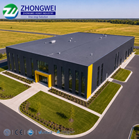 Solution moderne pour parcs industriels : Entrepôt à structure métallique avec bureau intégré, usine modulaire pour la logistique mondiale