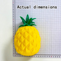 Vente en gros transfrontalière : Jouets de décompression musicaux à pétrir en caoutchouc souple TPR, en forme d'ananas géant, à rebond lent, avec effet de simulation de fruit
