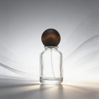 Vente en gros de flacons de parfum en verre vides de 50 ml, cylindriques et élégants, avec vaporisateur et boîte