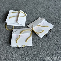 Petit sac à cils en papier personnalisé en gros emballage pour cils mini sac à main sac cadeau avec étui à corde sacs à cils blancs
