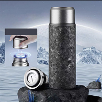 Bouteille d'eau isolée en titane pur à 99,9 %, tasse en titane à texture effet glace pour boissons chaudes et froides