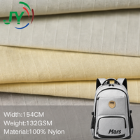 Tissu Taslan Ripstop 100% Nylon 132GSM Personnalisé, Imperméable, Coupe-Vent, Résistant aux Déchirures, Teint Uni, pour Vestes d'Extérieur, Vêtements de Travail et Sacs