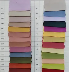 ผ้าเครปย่นสำหรับผู้หญิงผ้าทอโพลีเอสเตอร์ผ้าย้อมสีเรียบ100% แบบย่น