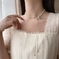 Kalung kupu-kupu klavikula kupu-kupu rumbai berlapis emas penjualan laris mode Korea kalung mutiara kupu-kupu elegan mewah