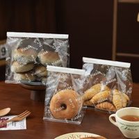 Nouveau modèle de sachet mini-support pour biscuits et snacks, entièrement transparent, avec bordure métallique, emballage de pâtisserie scellé, en nylon de qualité alimentaire, auto-scellant