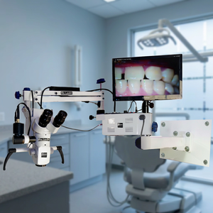 Microscope chirurgical dentaire avec tête inclinable à 180° °   Système optique incliné à zoom continu.. - Product Image 1