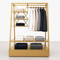 Présentoir de vêtements en métal noir en forme de A avec tringle de suspension, étagères et tiroir – Fixation de vente au détail haut de gamme
