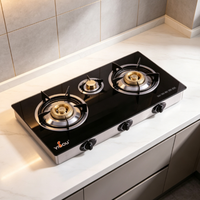 Kompor Gas Portable Outdoor Tiga Tungku Besi Cor dengan Permukaan Kaca Temper, Peralatan Dapur Rumah Tangga Cina