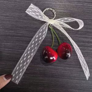 Llavero con diseño de fruta y lazo rojo cereza, con estilo adorable y dulce, para niñas - Product Image 5
